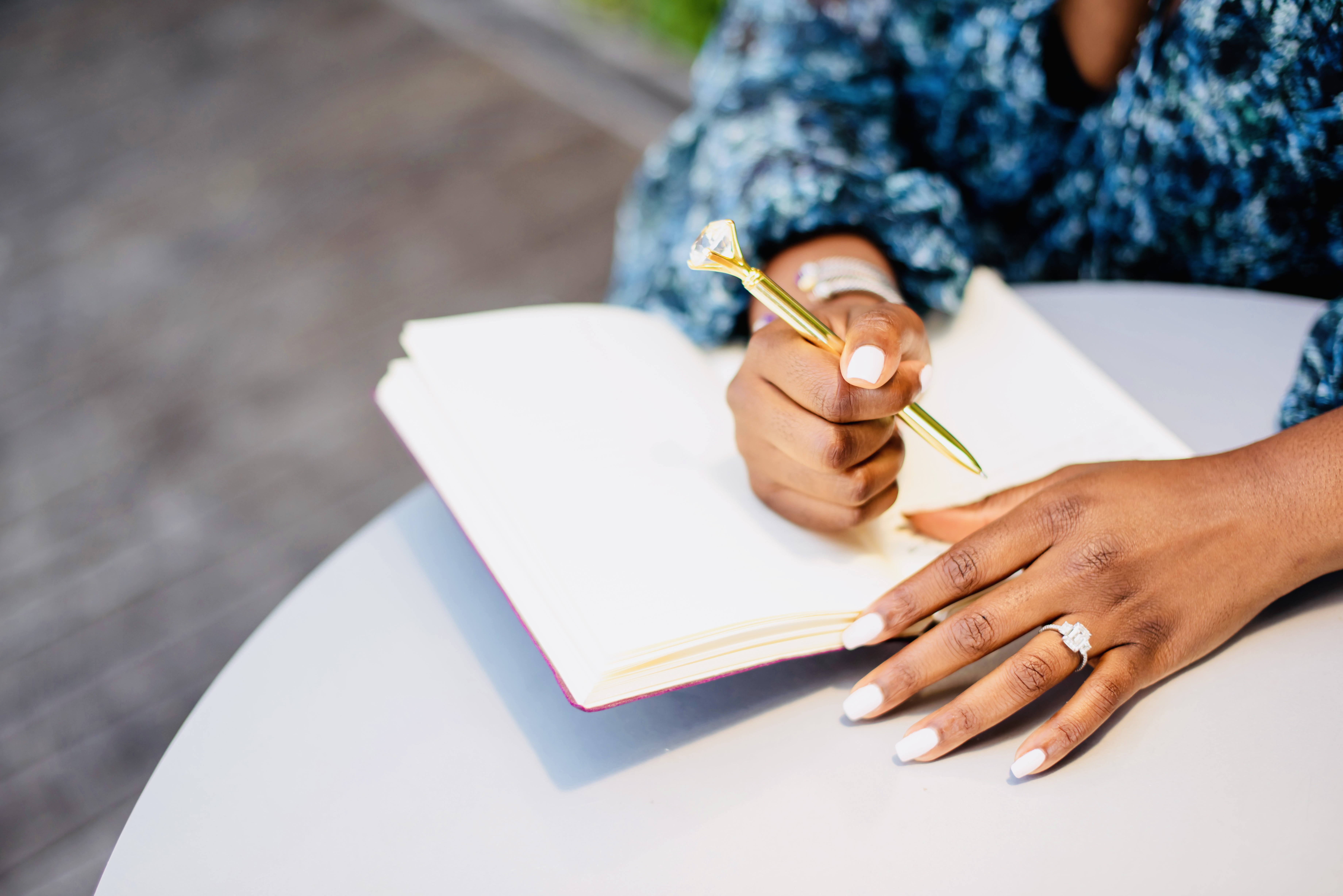 Amanda Miller Littlejohn writing in a notebook