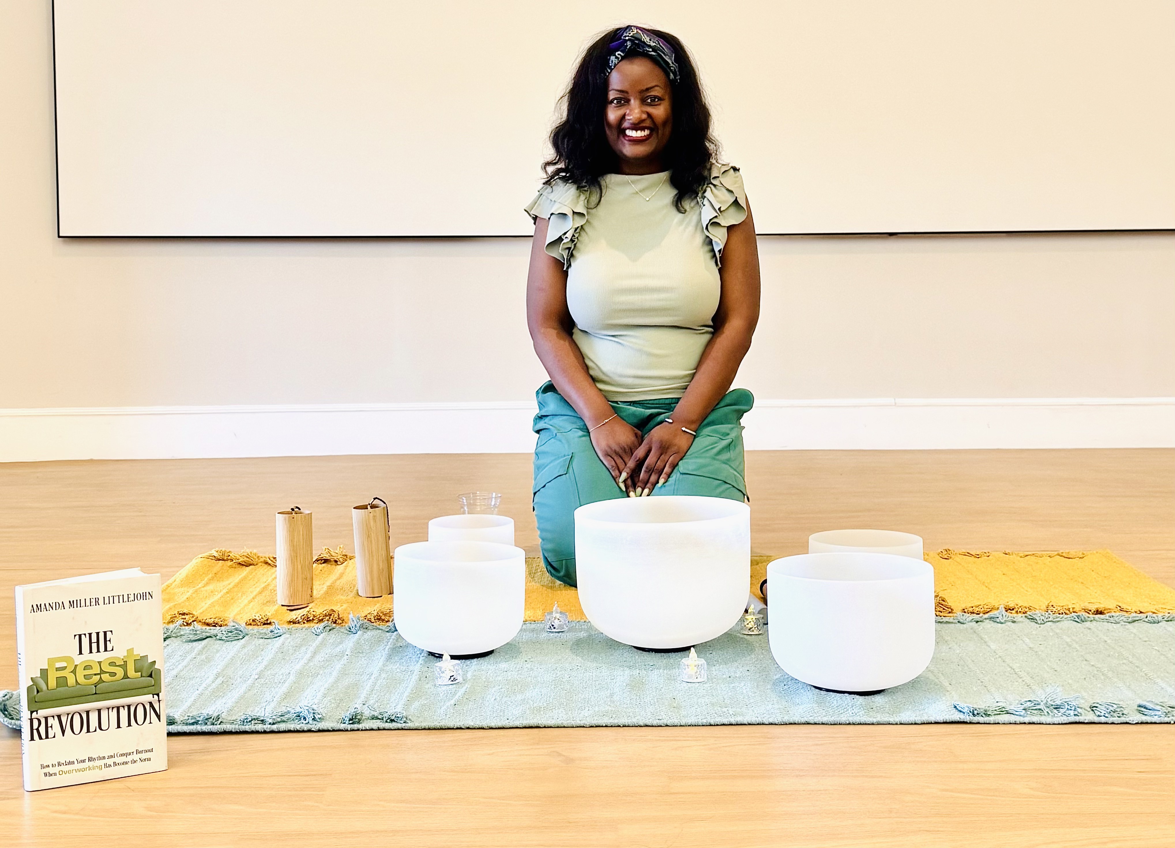 Amanda with crystal singing bowls for a restorative sound session